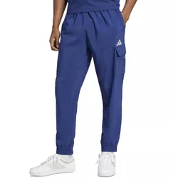 Blue athletic pants with a cargo pocket, Adidas logo, elastic waistband, and cuffs; paired with white Adidas sneakers.