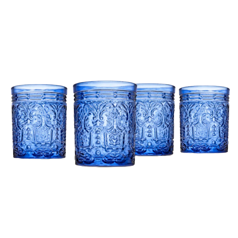 Set of four blue drinking glasses with intricate embossed designs, featuring a cylindrical shape and decorative patterns.