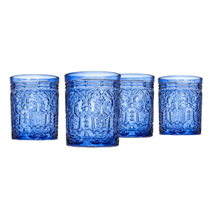 Set of four blue drinking glasses with intricate embossed designs, featuring a cylindrical shape and decorative patterns.