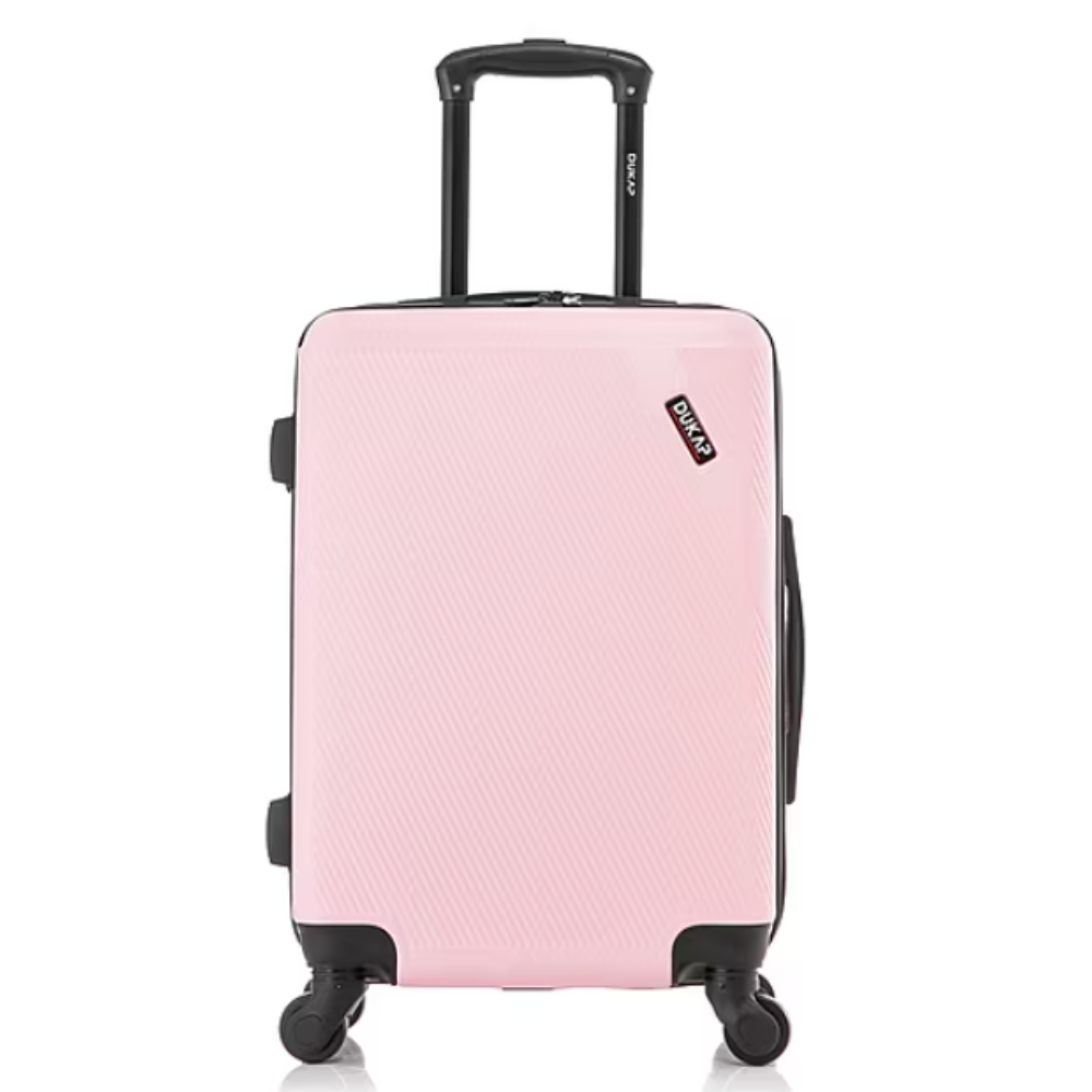 A light pink hard-shell suitcase with a telescopic handle and four swivel wheels.