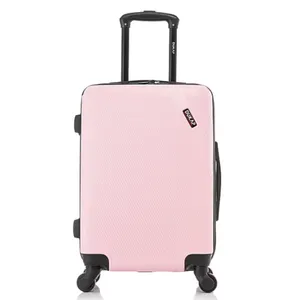 A light pink hard-shell suitcase with a telescopic handle and four swivel wheels.