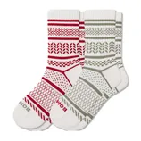 A pair of crew socks with geometric patterns, one in red and white and the other in olive and white. Each sock features brand lettering near the toe.