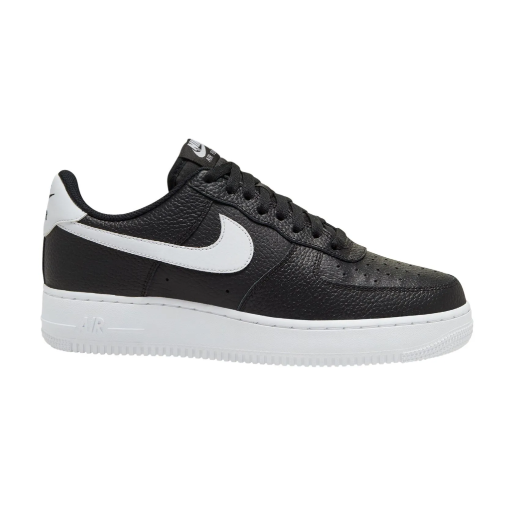Black Nike Air Force 1 Low sneaker with a white Swoosh and midsole, featuring perforated leather for ventilation and a classic lace-up design.