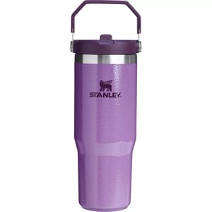 A purple 30oz Stanley IceFlow Tumbler with a handle and lid, designed for holding beverages. Features a textured finish and the Stanley logo.