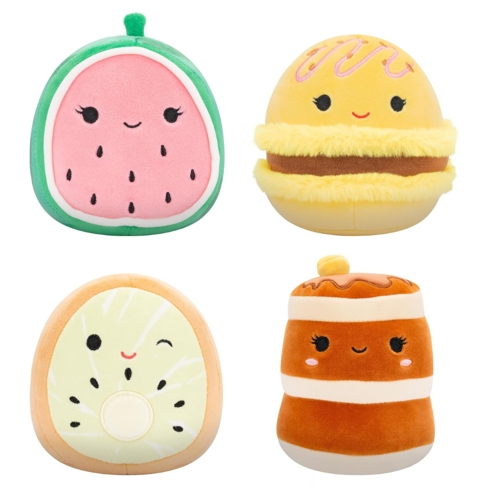 Four plush toys shaped like cute foods: a happy watermelon, a sandwich, a winking kiwi, and a smiling pancake stack with syrup and a pat of butter.