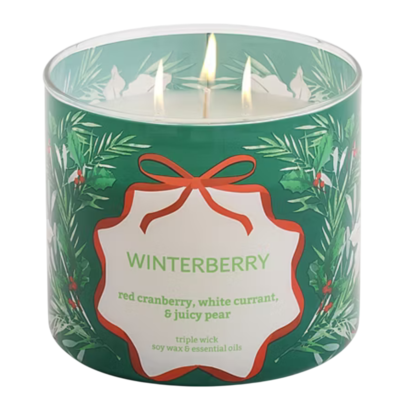 A green Winterberry candle featuring scents of red cranberry, white currant, and juicy pear, with three wicks made from soy wax and essential oils.