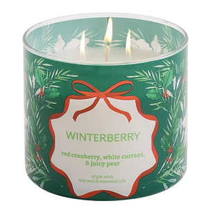 A green Winterberry candle featuring scents of red cranberry, white currant, and juicy pear, with three wicks made from soy wax and essential oils.