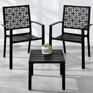 Two black patio chairs with intricate lattice back designs are paired with a matching square side table. A small potted plant is placed on the table.