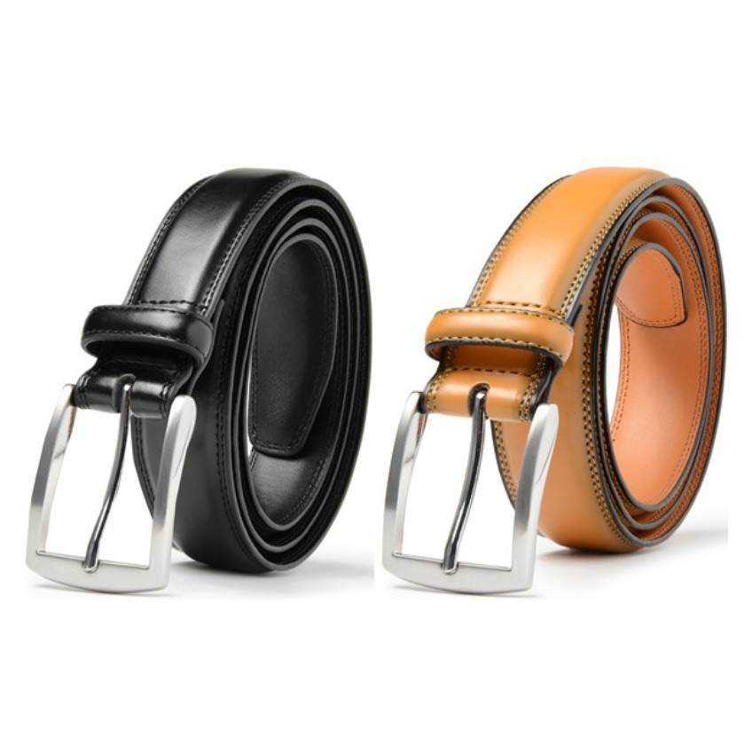 Two rolled-up leather dress belts, one black and one tan, each featuring a silver-toned buckle.