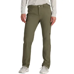A person is wearing olive green pants, paired with a white long-sleeve shirt and light gray sneakers.