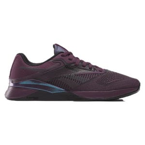 Reebok Women's Nano X Shoes in dark purple feature a mesh upper for breathability, a supportive heel clip, and a cushioned midsole for comfort and stability in workouts.
