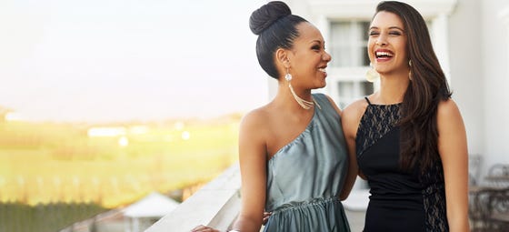 women attending a wedding in formalwear