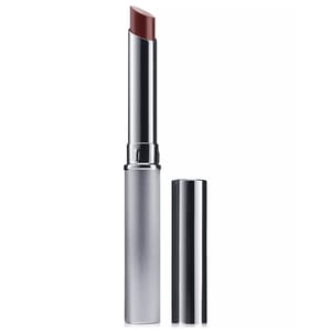 A sleek, silver-cased lipstick with a cap removed, revealing a bullet of brownish shade.