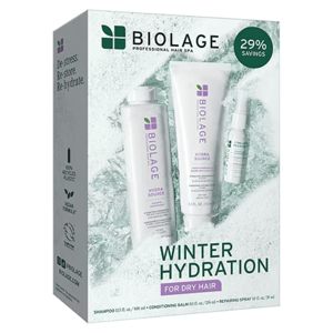 Biolage Winter Hydration set for dry hair includes Hydra Source shampoo (13.5 fl. oz./400 ml), conditioning balm (8.0 fl. oz./236 ml), and repairing spray (1.0 fl. oz./30 ml). Features 100% recycled plastic and vegan formula.