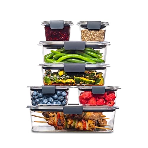 Stacked clear plastic containers with black latches, filled with various foods including vegetables, fruits, grains, and cooked meat.