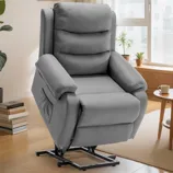 A gray reclining chair with a built-in lift mechanism, designed for assistance in standing up, features a pocket on the side and is set in a modern living room environment.