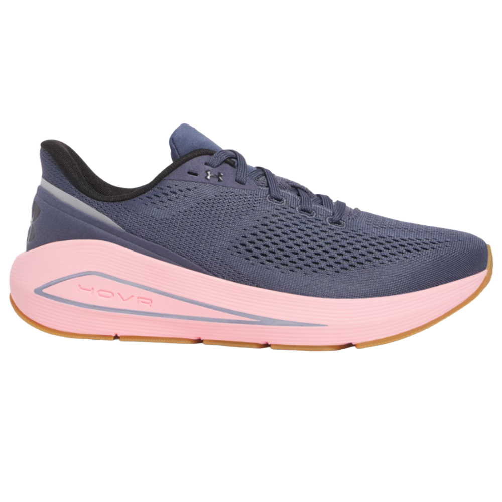 A running shoe with a navy blue mesh upper, pink cushioned midsole featuring \“HOVR\“ branding, and a brown rubber outsole.