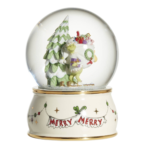 A snow globe depicting a green character with a Christmas tree and sack of gifts, on a base with \“Merry Merry\“ text and decoration.