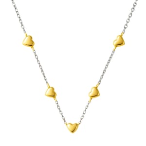 A silver chain necklace featuring five evenly spaced, small gold heart-shaped charms.