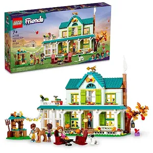 The LEGO Friends Autumn's House set features a two-story house with a detailed interior, a tree, and several mini-doll figures and animals. The house has a green and teal color scheme with an autumnal outdoor theme.