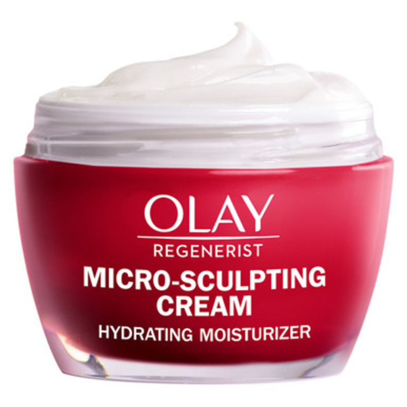 Olay Regenerist Micro-Sculpting Cream is a hydrating moisturizer designed to improve skin elasticity and reduce the appearance of fine lines and wrinkles. It's packaged in a red jar with a white cream inside.
