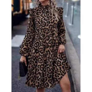 A long-sleeve, high-neck leopard-print dress with a ruffled hemline and subtle front slit, paired with a black clutch.