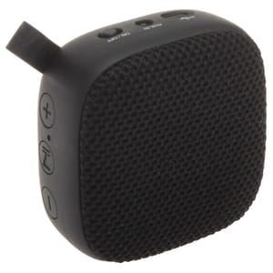 Black JVC wireless speaker with a textured fabric front, featuring volume and power controls on the side, and ports for AUX and USB on the top.