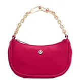 A small pink handbag with a gold chain strap, featuring a logo on the front.
