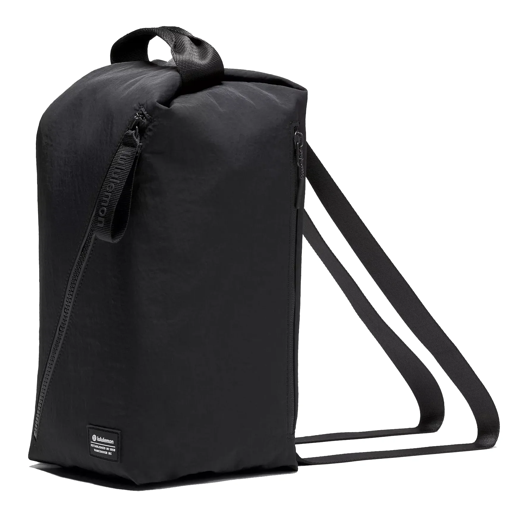 A black rectangular backpack with side zippers and dual shoulder straps, featuring a top handle. Brand label visible at the bottom corner.