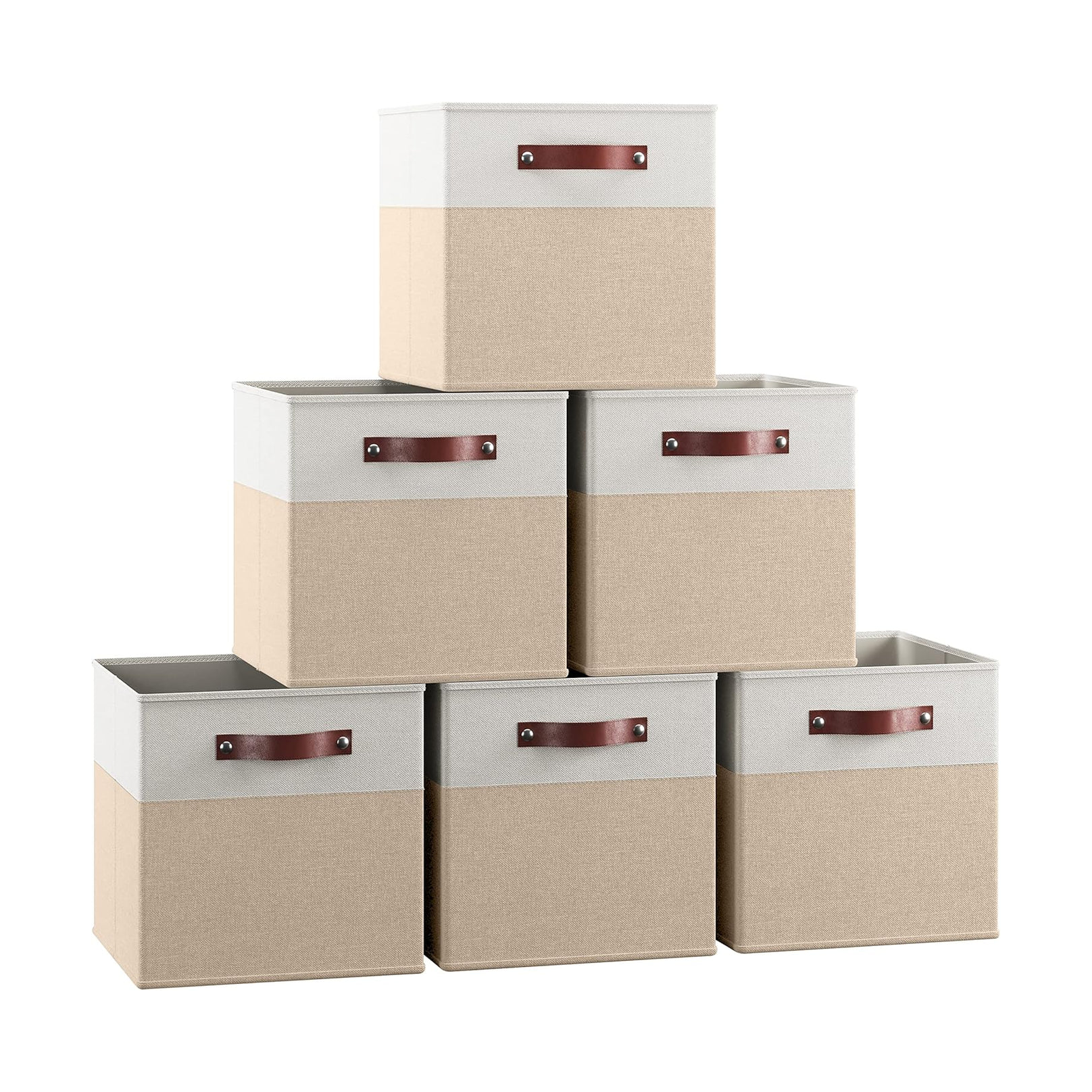 Set of six beige and white fabric storage bins with brown handles, stacked in a pyramid formation.