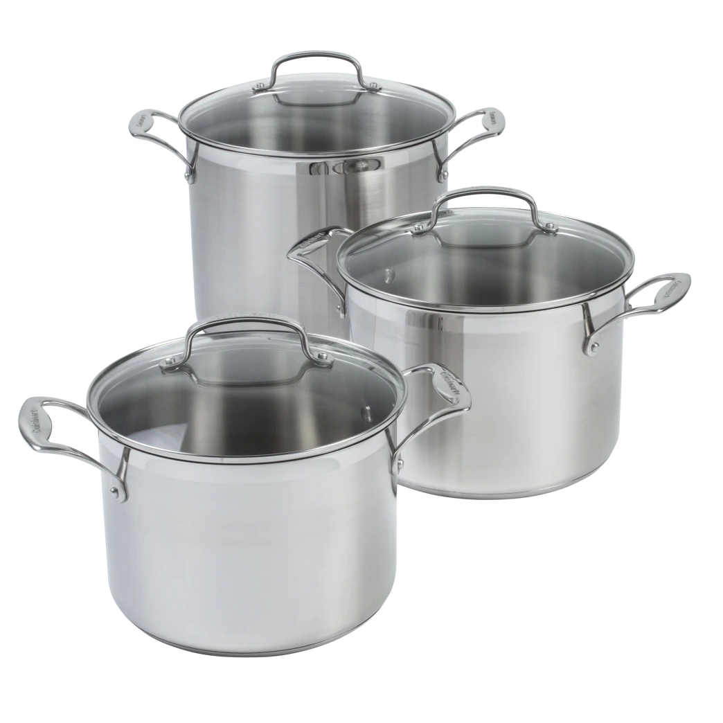 A set of three stainless steel stock pots with glass lids and metal handles, varying in size.