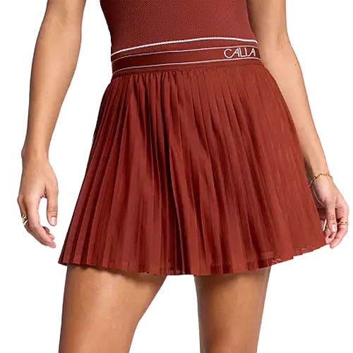 A pleated rust-colored skirt with a wide waistband featuring the brand name \“Calla\“ at the top.