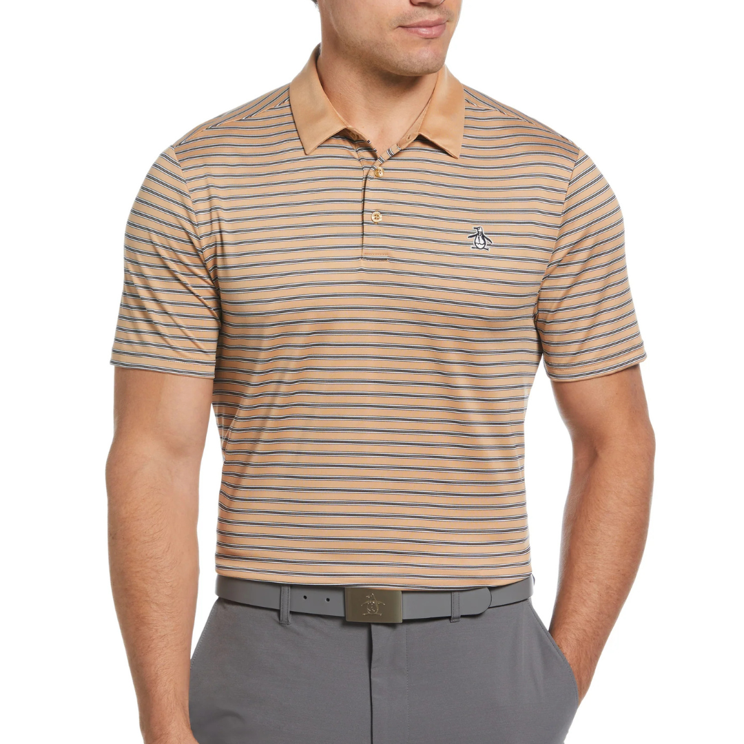 A man is wearing a beige and blue striped polo shirt with a penguin logo, paired with gray pants and a matching gray belt.