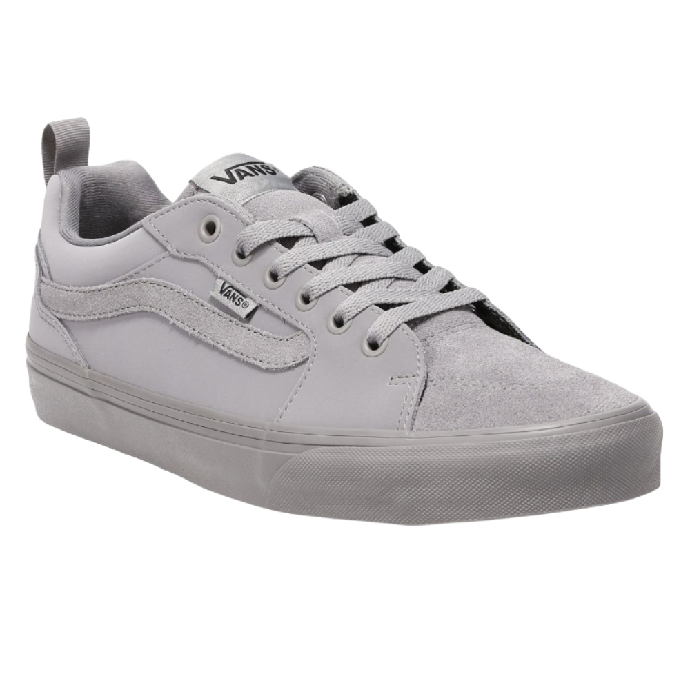 A gray Vans sneaker with suede detailing, featuring a low-top design, lace-up front, and Vans logo on the side.