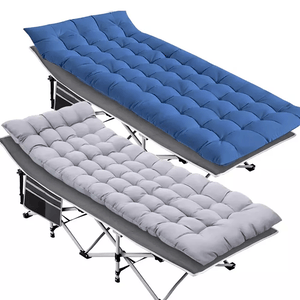 Two folding camp cots with padded cushions, one in blue and one in grey.
