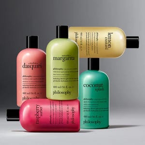 Four colorful Philosophy brand shower gels: Melon Daiquiri, Senorita Margarita, Lemon Custard, and Coconut Splash.