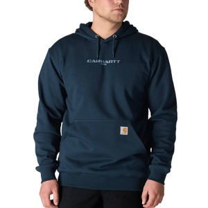 A person is wearing a dark blue Carhartt hoodie with a front pouch pocket and the brand's logo on the chest.