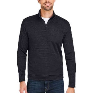 A man wears a dark, long-sleeved quarter-zip pullover with subtle horizontal stripes, paired with jeans.
