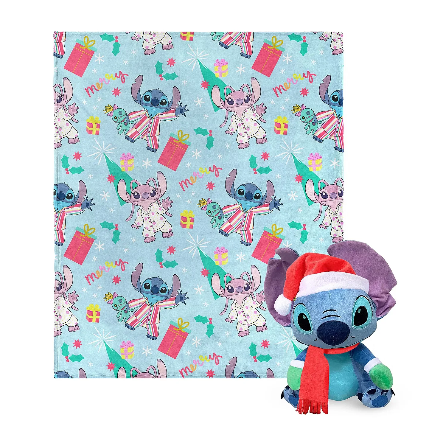 A holiday-themed blanket featuring Stitch and Angel in pajamas, with gifts and \“merry\“ text on a light blue background, paired with a plush toy of Stitch wearing a Santa hat and scarf.