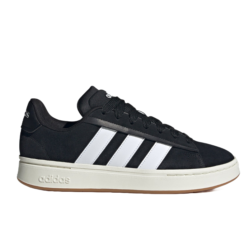 A black Adidas sneaker featuring three white stripes on the side, with a white sole and the Adidas logo on the heel.
