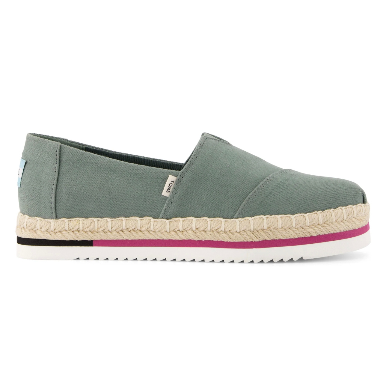 TOMS Alpargata Platform Espadrilles feature a green canvas upper with a braided rope midsole and a pink stripe accent. They have a white rubber sole with ridges for grip and display the TOMS brand tag on the side.