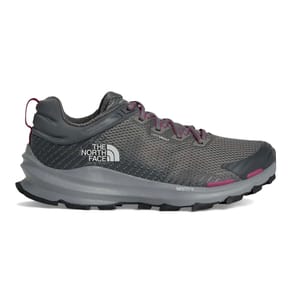 The North Face VECTIV trail running shoe in dark gray with pink accents features a mesh upper, DRYVENT technology, and a grippy sole.