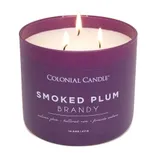 Colonial Candle Smoked Plum Brandy features scents of autumn plum, buttered rum, and fireside embers. It is a 14.5 oz (411g) candle with three wicks.