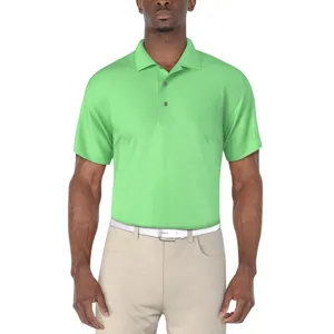 A man wearing a light green short-sleeve polo shirt and beige pants with a white belt.