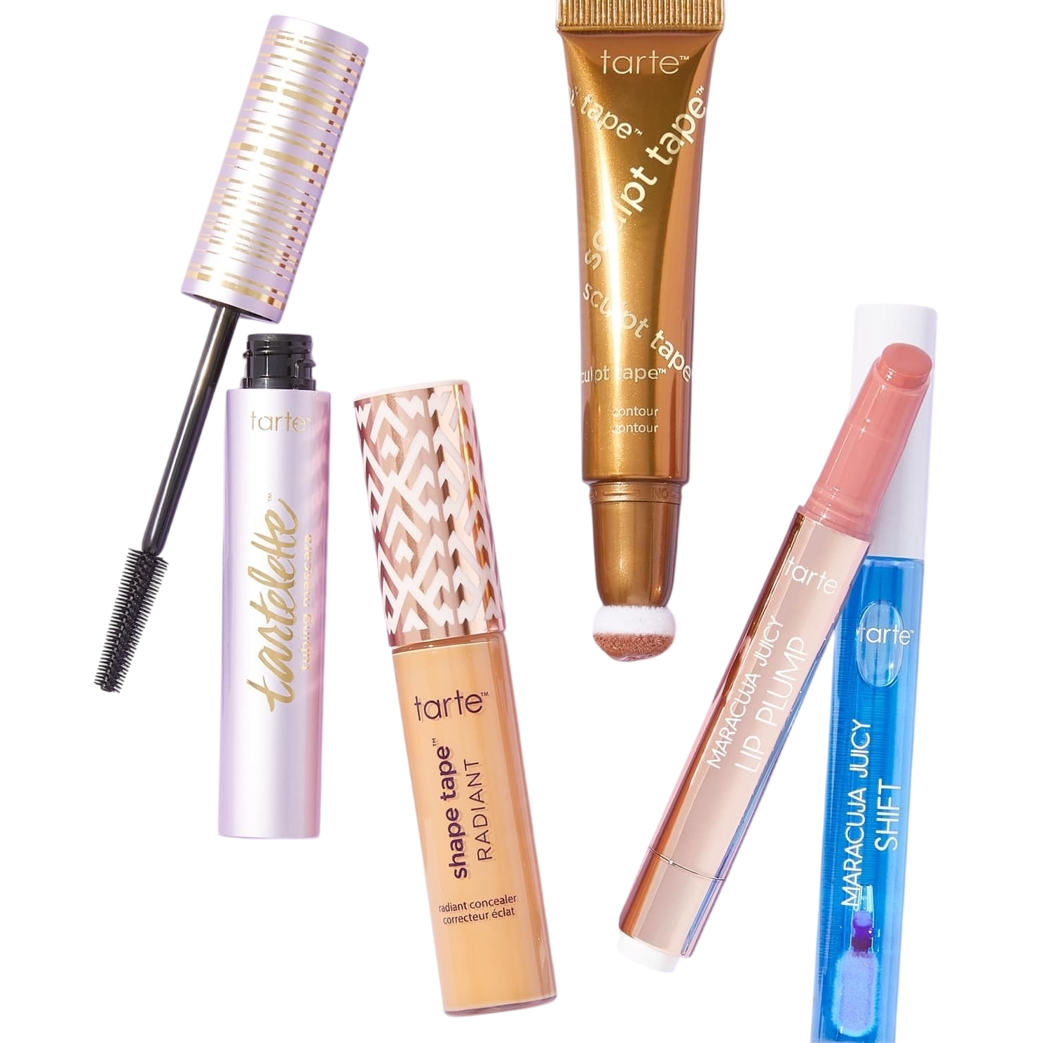 A collection of Tarte products including the Tartelette mascara, Shape Tape Radiant concealer, Sculpt Tape contour, Maracuja Juicy Lip Plump, and Maracuja Juicy Shift.
