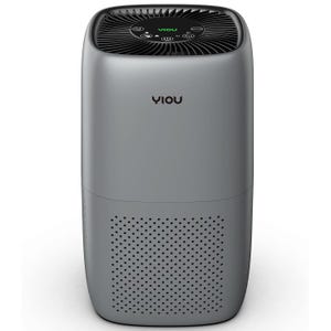 A compact grey air purifier featuring a cylindrical design with top controls for speed, mode, and power. It is branded \“YIOU\“ with perforations on the lower half for air intake.
