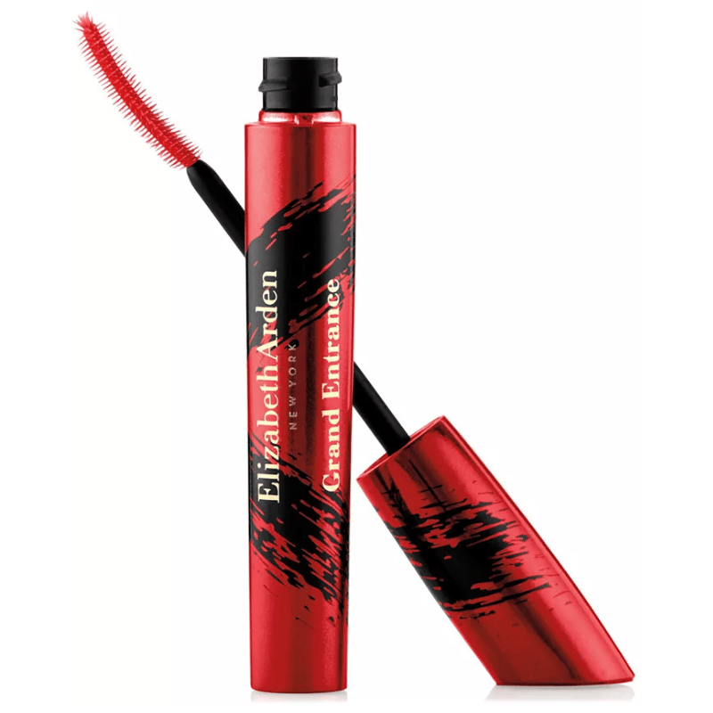 Elizabeth Arden Grand Entrance Mascara features a vibrant red and black tube with a curved brush designed for volume and lift, promising bold lash effects.