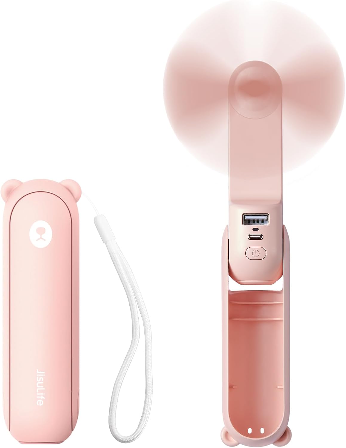 A pink handheld fan with a bear ear design, featuring a USB charging port and a power button. Comes with a white wrist strap for easy carrying.