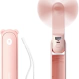 A pink handheld fan with a bear ear design, featuring a USB charging port and a power button. Comes with a white wrist strap for easy carrying.