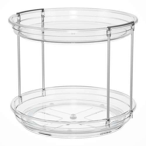 Clear two-tier lazy Susan with metal supports, ideal for organizing items.